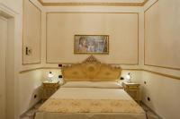 Hotel Trinacriaにあるベッド