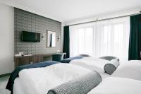 Postel nebo postele na pokoji v ubytování Hotel Zlatá Hvězda