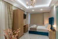 Posteľ alebo postele v izbe v ubytovaní AGORA luxury BOUTIQUE HOTEL