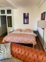 Łóżko lub łóżka w pokoju w obiekcie La Villa Romaine