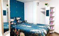 Łóżko lub łóżka w pokoju w obiekcie Jolie appartement avec 2 chambres partagées