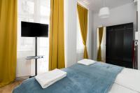 Łóżko lub łóżka w pokoju w obiekcie Kwiatowa Apartments Poznań City Center by Noclegi Renters