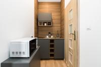 Kuchnia lub aneks kuchenny w obiekcie Kwiatowa Apartments Poznań City Center by Noclegi Renters