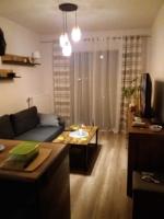 Televízia a/alebo spoločenská miestnosť v ubytovaní Apartament Magda