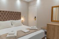 Posteľ alebo postele v izbe v ubytovaní AGORA luxury BOUTIQUE HOTEL