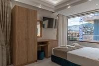 Posteľ alebo postele v izbe v ubytovaní AGORA luxury BOUTIQUE HOTEL