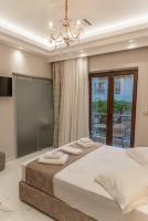 Posteľ alebo postele v izbe v ubytovaní AGORA luxury BOUTIQUE HOTEL