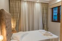 Posteľ alebo postele v izbe v ubytovaní AGORA luxury BOUTIQUE HOTEL