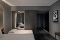 Hotel AMANO Covent Gardenにあるベッド