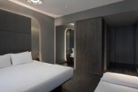 Hotel AMANO Covent Gardenにあるベッド