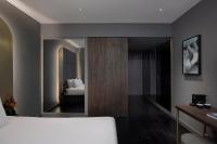 Hotel AMANO Covent Gardenにあるベッド