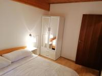 Posteľ alebo postele v izbe v ubytovaní Apartment Smoljanac 14979a