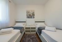 Posteľ alebo postele v izbe v ubytovaní La Prima Privlaka Luxury Apartments I