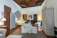A bed or beds in a room at Isla Baja Suites