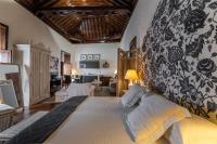A bed or beds in a room at Isla Baja Suites