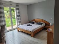 Łóżko lub łóżka w pokoju w obiekcie Villa Jade