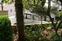 Vonkajšia záhrada v ubytovaní Apartment Podgora 518d