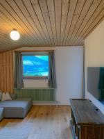 TV a/nebo společenská místnost v ubytování Landhaus Gappmaier