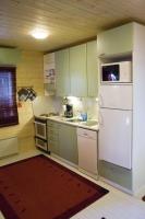 Kuchyň nebo kuchyňský kout v ubytování Vanha Väätänen Cottage