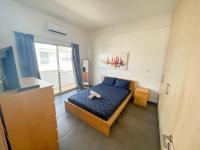 Postel nebo postele na pokoji v ubytování High Speed Holiday Apartment
