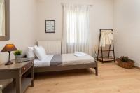 Posteľ alebo postele v izbe v ubytovaní Πλήρως ανακαινισμένη μονοκατοικία.