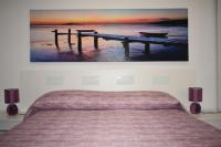 Postel nebo postele na pokoji v ubytování Apartamentos Flor del Cotillo