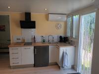 Kuchyň nebo kuchyňský kout v ubytování Eco Resort Costa Blanca