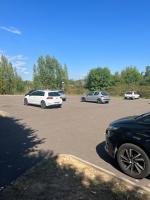 a group of cars parked in a parking lot at Cocon Accès facile Parking Gratuit in Belfort