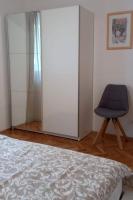 Posteľ alebo postele v izbe v ubytovaní Apartment Podgora 2594b