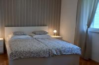 Posteľ alebo postele v izbe v ubytovaní Apartment Podgora 2594b