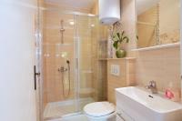 Kúpeľňa v ubytovaní Apartment Podgora 2594b
