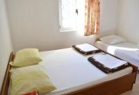 Posteľ alebo postele v izbe v ubytovaní Apartments by the sea Podaca, Makarska - 2617