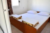 Posteľ alebo postele v izbe v ubytovaní Apartments by the sea Podaca, Makarska - 2617