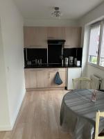 Kuchyňa alebo kuchynka v ubytovaní Superbe appartement en résidence avec piscine.
