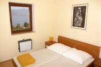 Posteľ alebo postele v izbe v ubytovaní Apartments with a swimming pool Splitska, Brac - 2889