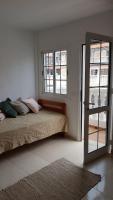Postel nebo postele na pokoji v ubytování CASA DEL MAR - Cozy Beach House