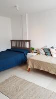 Postel nebo postele na pokoji v ubytování CASA DEL MAR - Cozy Beach House