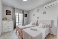 Postel nebo postele na pokoji v ubytování VILLA PALMA CANARIAS