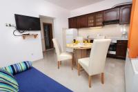 Kuchyň nebo kuchyňský kout v ubytování Apartments Marin