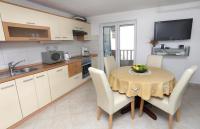 Kuchyň nebo kuchyňský kout v ubytování Apartments Marin
