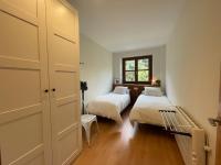 A bed or beds in a room at B28 - Resid. La Coma 2º - Villmor