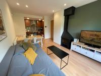 A television and/or entertainment centre at B28 - Resid. La Coma 2º - Villmor