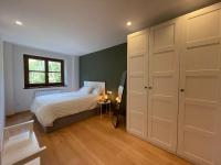 A bed or beds in a room at B28 - Resid. La Coma 2º - Villmor