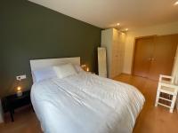 A bed or beds in a room at B28 - Resid. La Coma 2º - Villmor