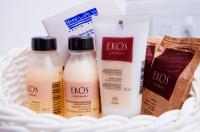 a basket of food with three bottles of milk at Barra do Piuva Porto Hotel in Ilhabela