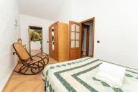A bed or beds in a room at Casa Rural La Capellania
