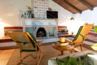A television and/or entertainment centre at Casa Rural La Capellania