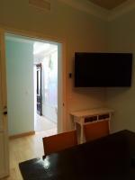 Televízia a/alebo spoločenská miestnosť v ubytovaní Apartamento La Casilla Chica
