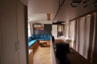 Posedenie v ubytovaní Mobil Home 3 chambres 2 salle de bain 2 WC Camping 4 Stars LES CHARMETTES Parcelle privée prestige