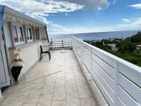 En balkon eller terrasse p&aring; A la Belle aux &eacute;toiles